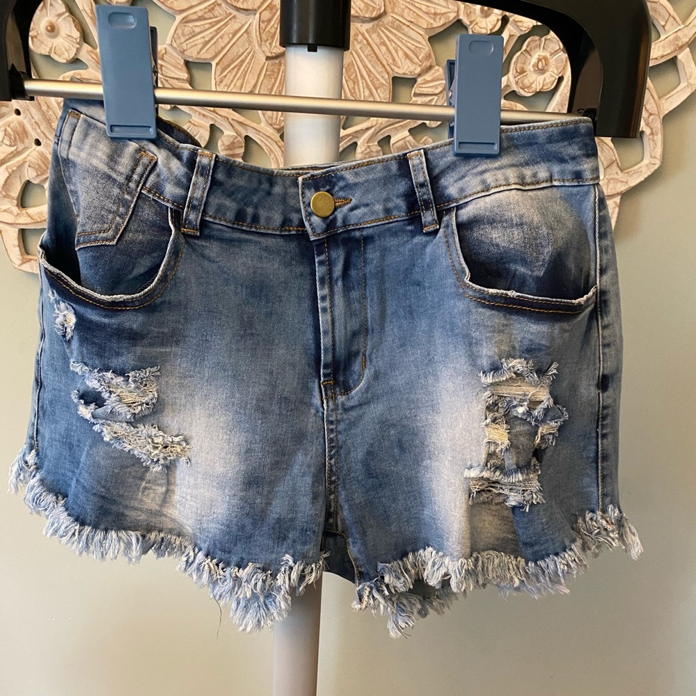 Denim shorts, frayed hem